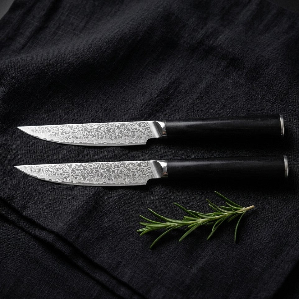 Cuchillos Chuleteros Kaen VG10 (pareja) — Dos chuleteros de damasco VG10 para la mesa.